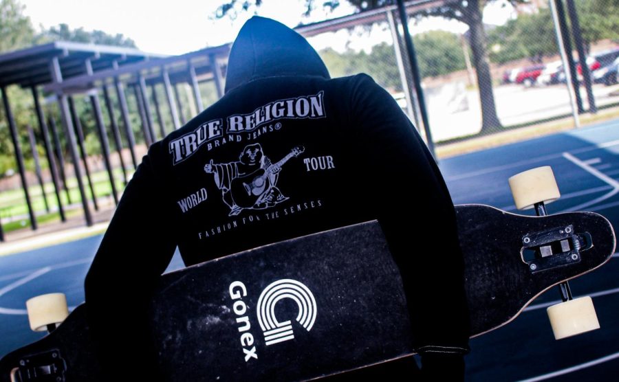 Brian Guerrero showing off his thrifted hoodie.